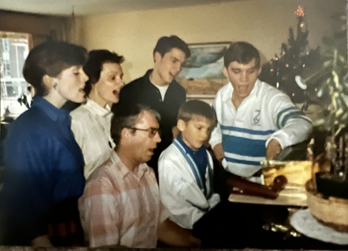 A rare photo of Beth's whole family together, singing of course!